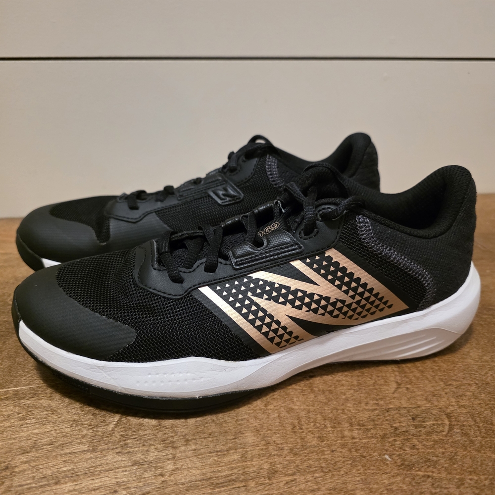 New Balance Black Sneakers with Metallic Rose Accent